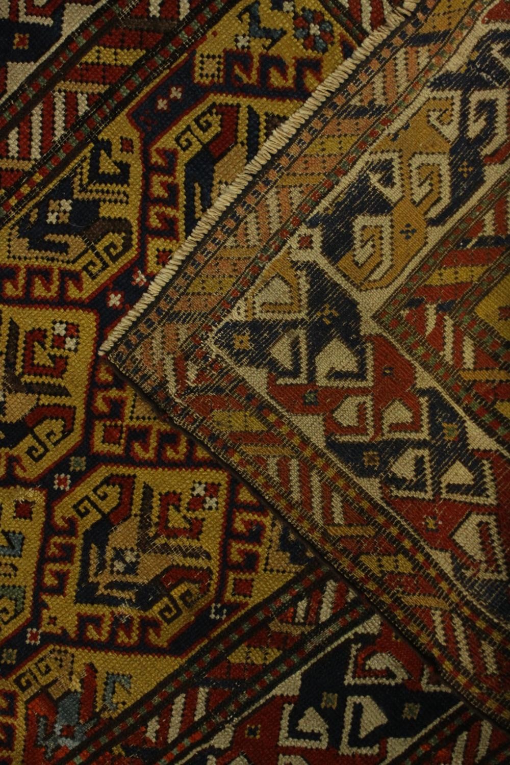 A gold ground hand made Kazak rug. L.151 W.88cm. - Image 6 of 6