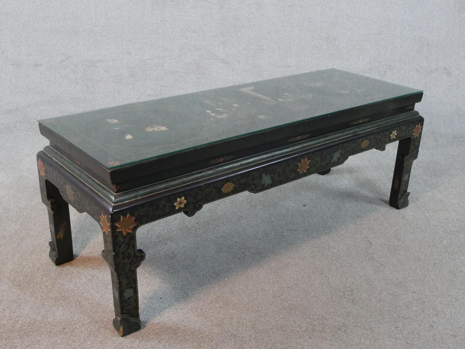 A Chinese lacquered coffee table with all over hand painted decoration. With plate glass top. H.47 - Image 4 of 6