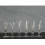 Six 19th century petal faceted champagne glasses, three of the same design. H.17 Diam.7cm (largest)