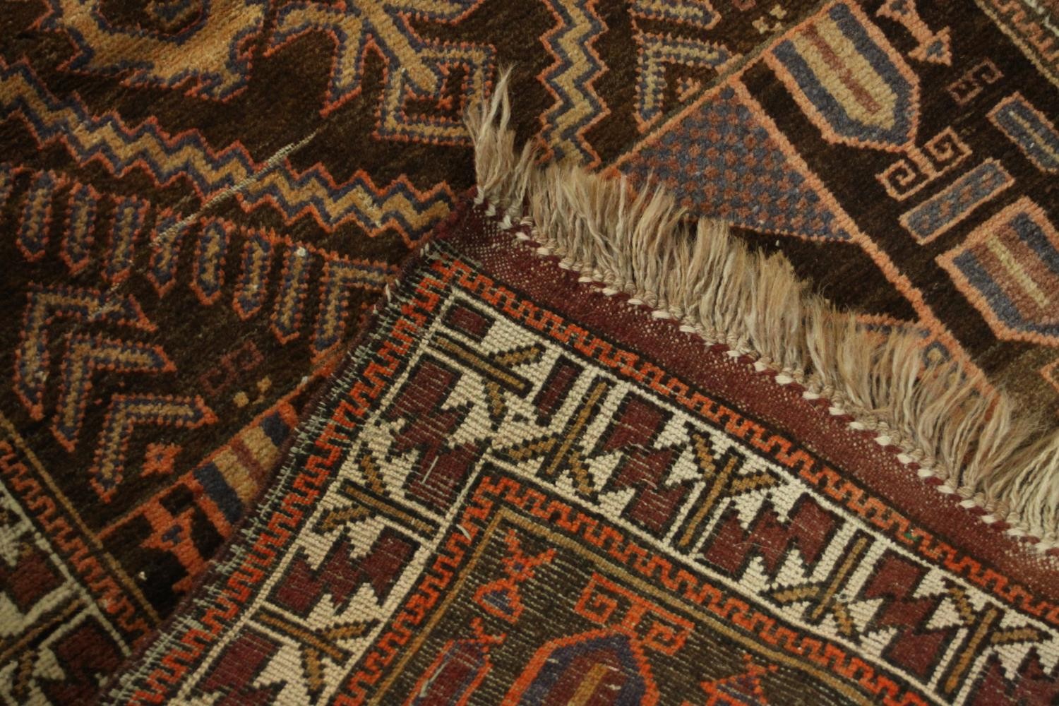 A hand made mocha ground Belouch rug. L.152 W.79cm. - Image 4 of 4