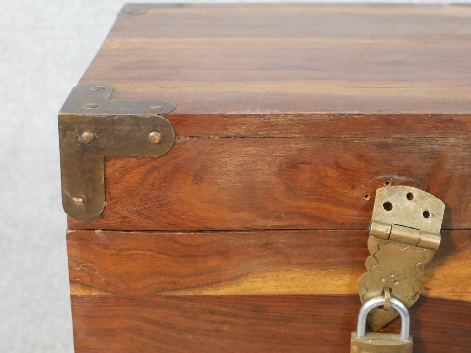 An Indian hardwood cube chest with brass detailing to the corners and padlock. H.46 W.40 D.40cm - Image 3 of 7