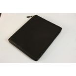 A Comme des Garcons black leather zip up folio/Ipad case with internal compartments. L.28 W.23 D.