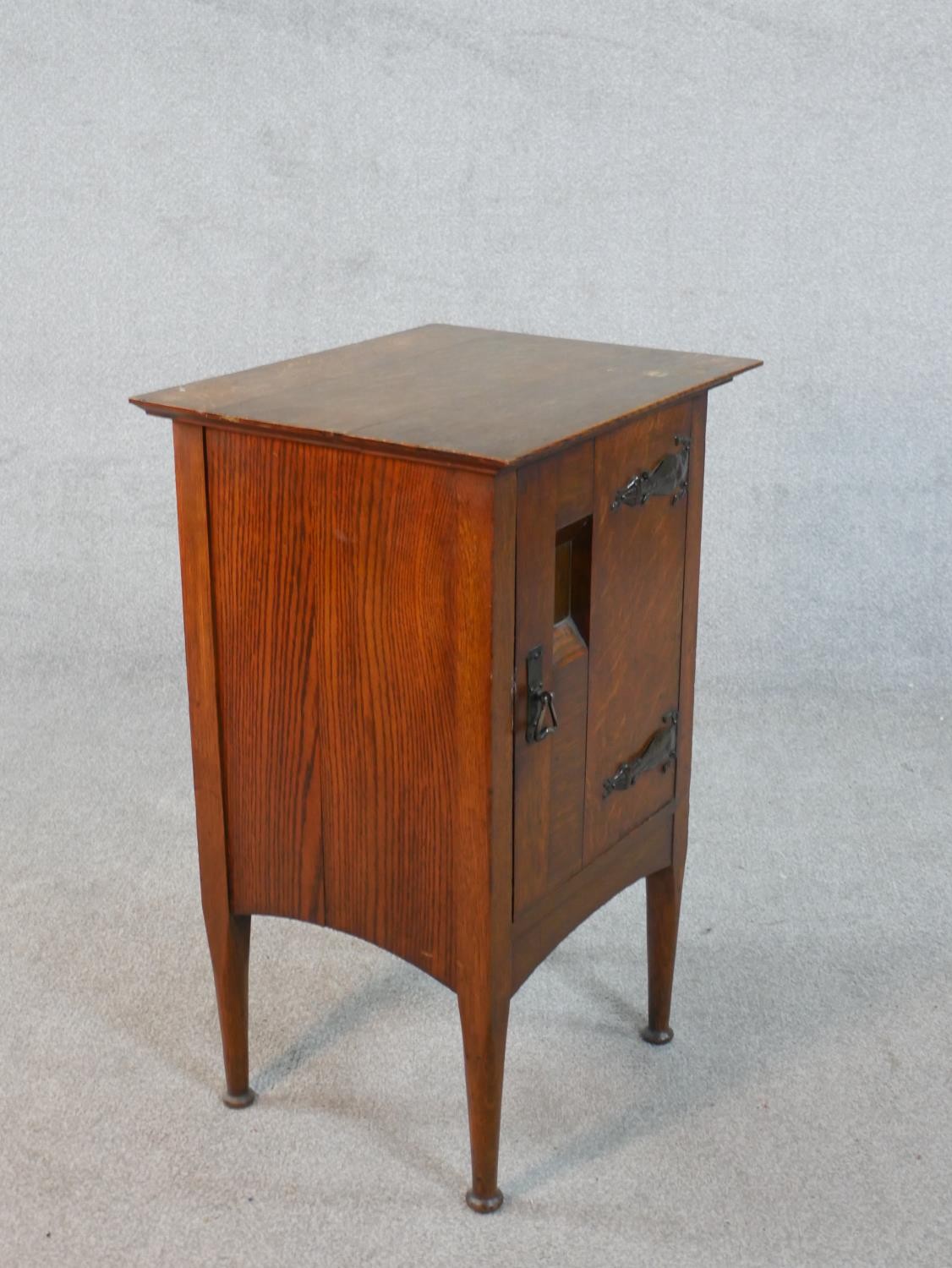 A Harris Lebus Arts and Crafts oak bedside cabinet with recessed panel door on tapering pad foot - Image 6 of 6