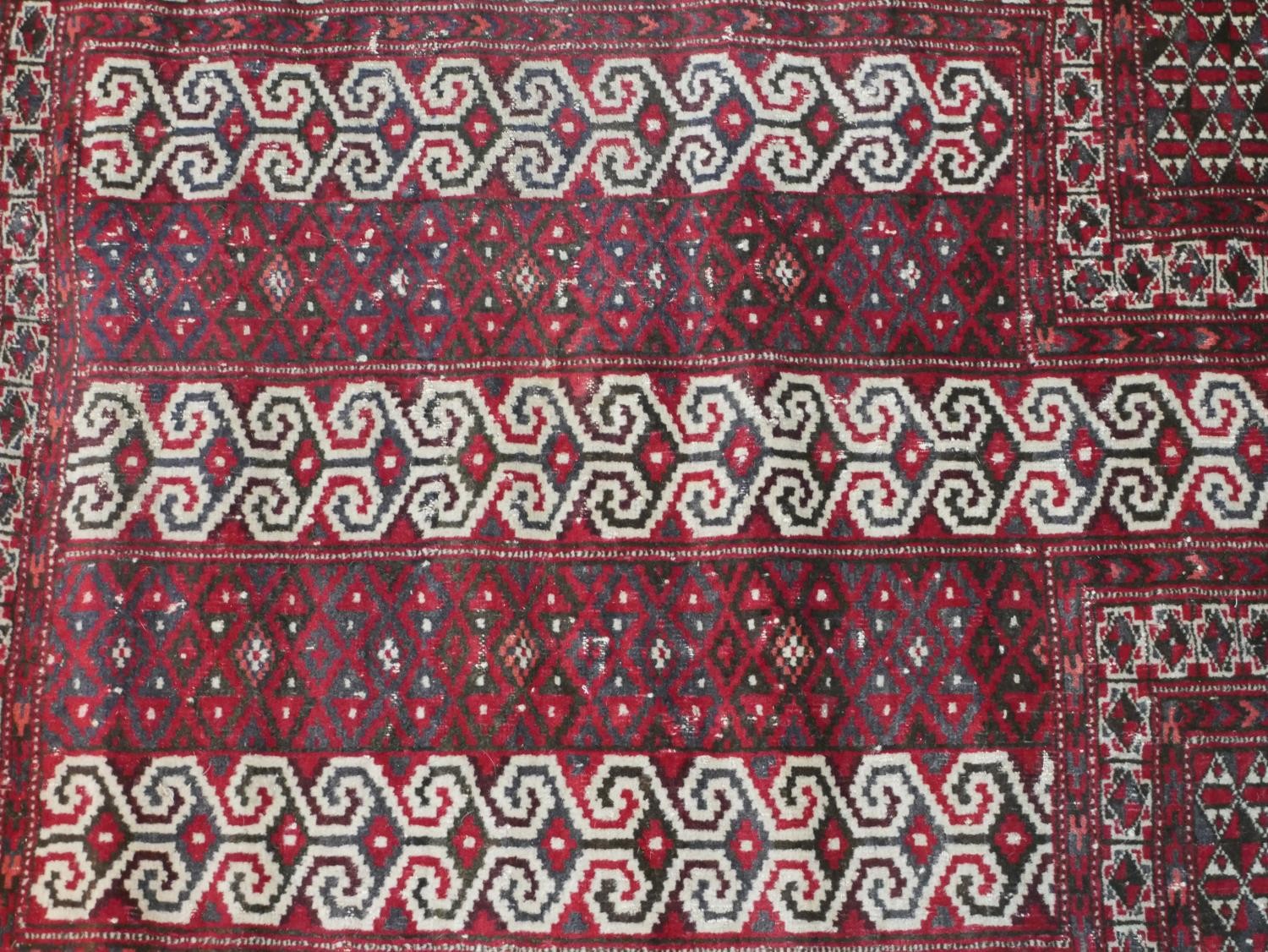 A red ground handmade Persian Turkman rug. L.115 W.100cm - Image 3 of 7