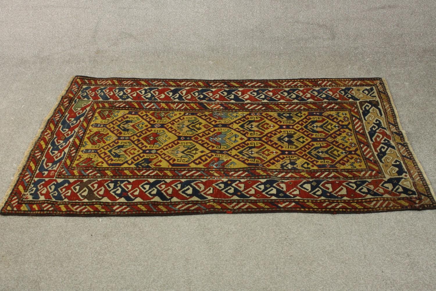 A gold ground hand made Kazak rug. L.151 W.88cm. - Image 2 of 6