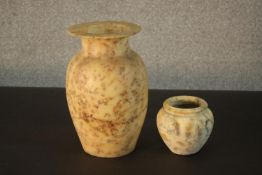 Two Egyptian carved alabaster vases. H.25 D.15cm. (largest)