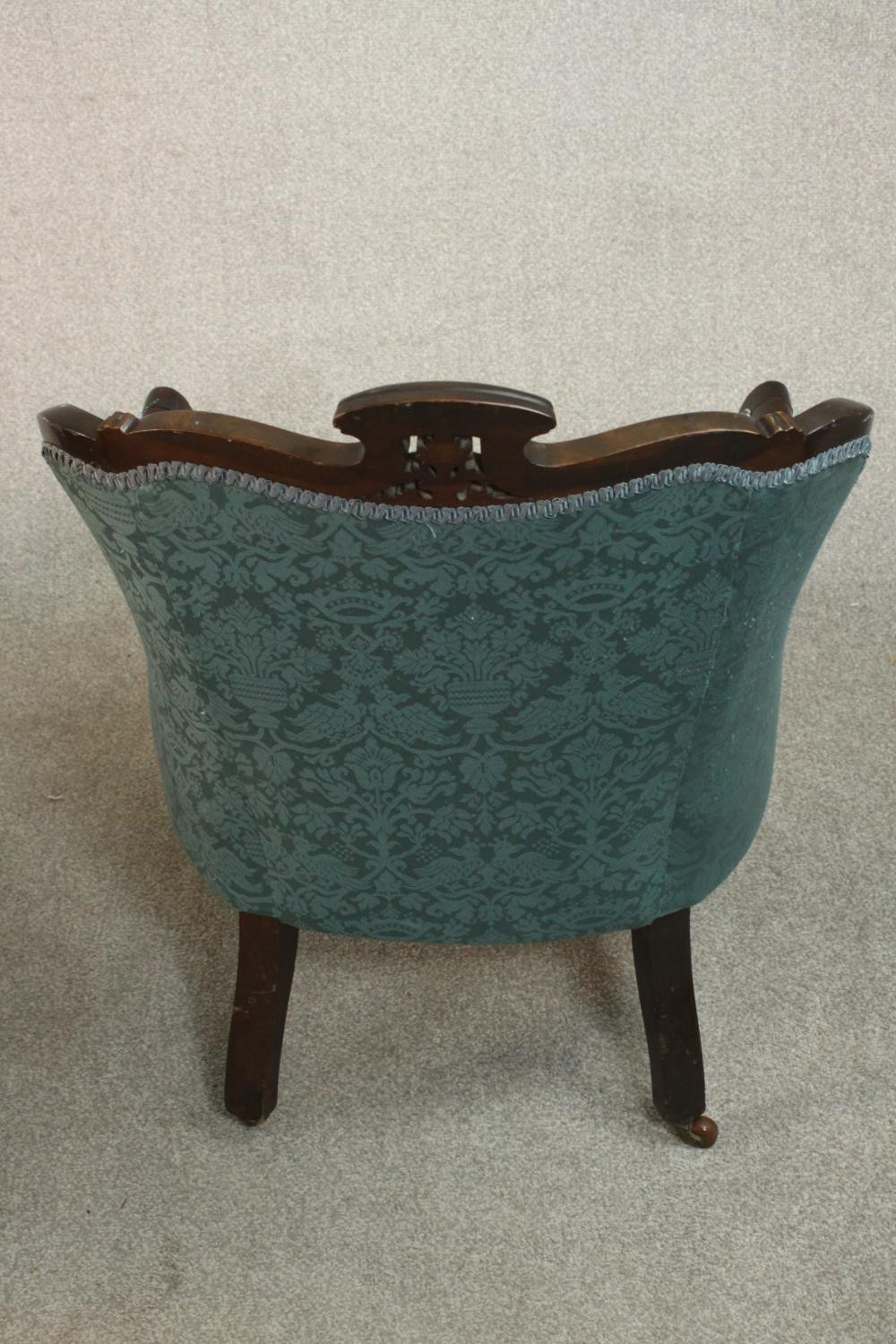 A pair of Edwardian walnut tub armchairs, upholstered in buttoned blue damask, with scrolling arms - Image 10 of 10