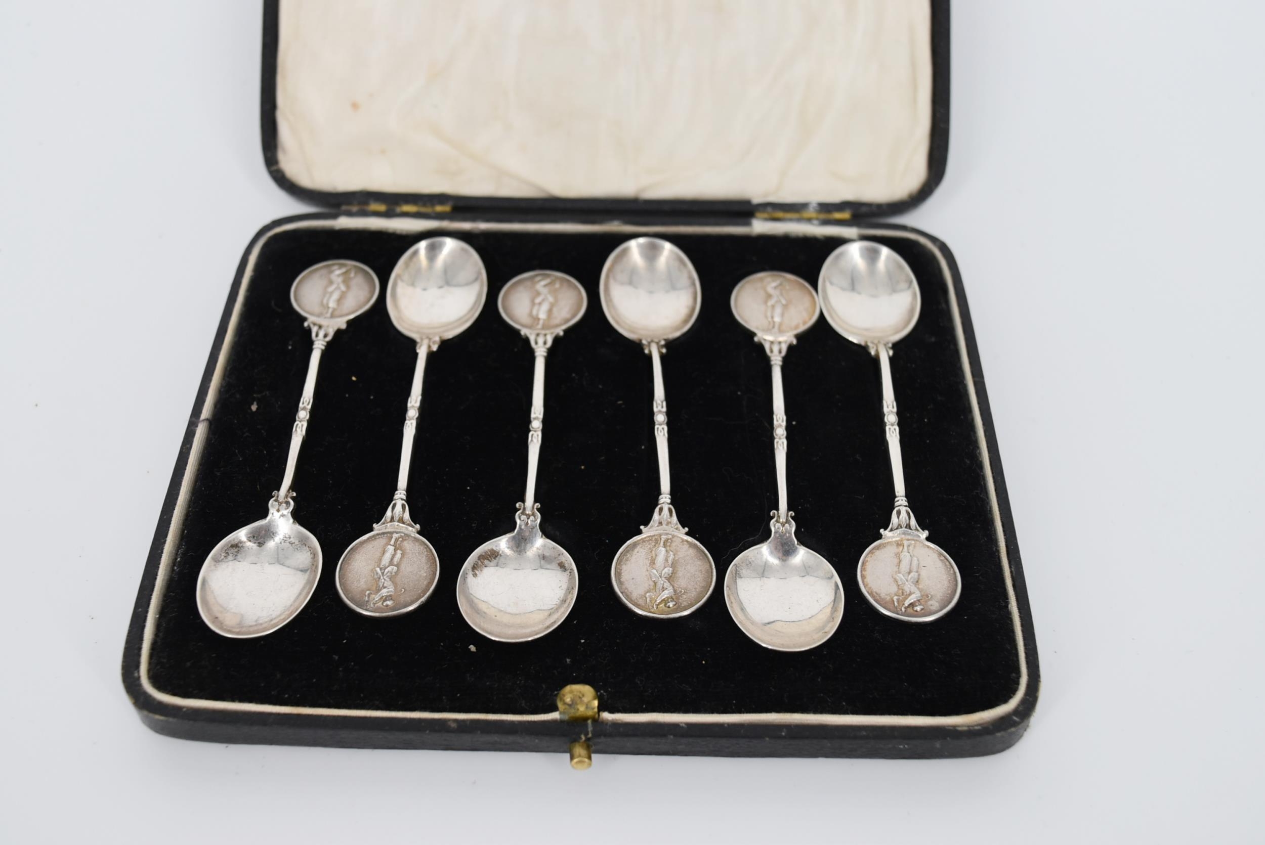 A cased set of silver tea spoons by James Fenton, each of the finials in a relief medal design - Image 2 of 5