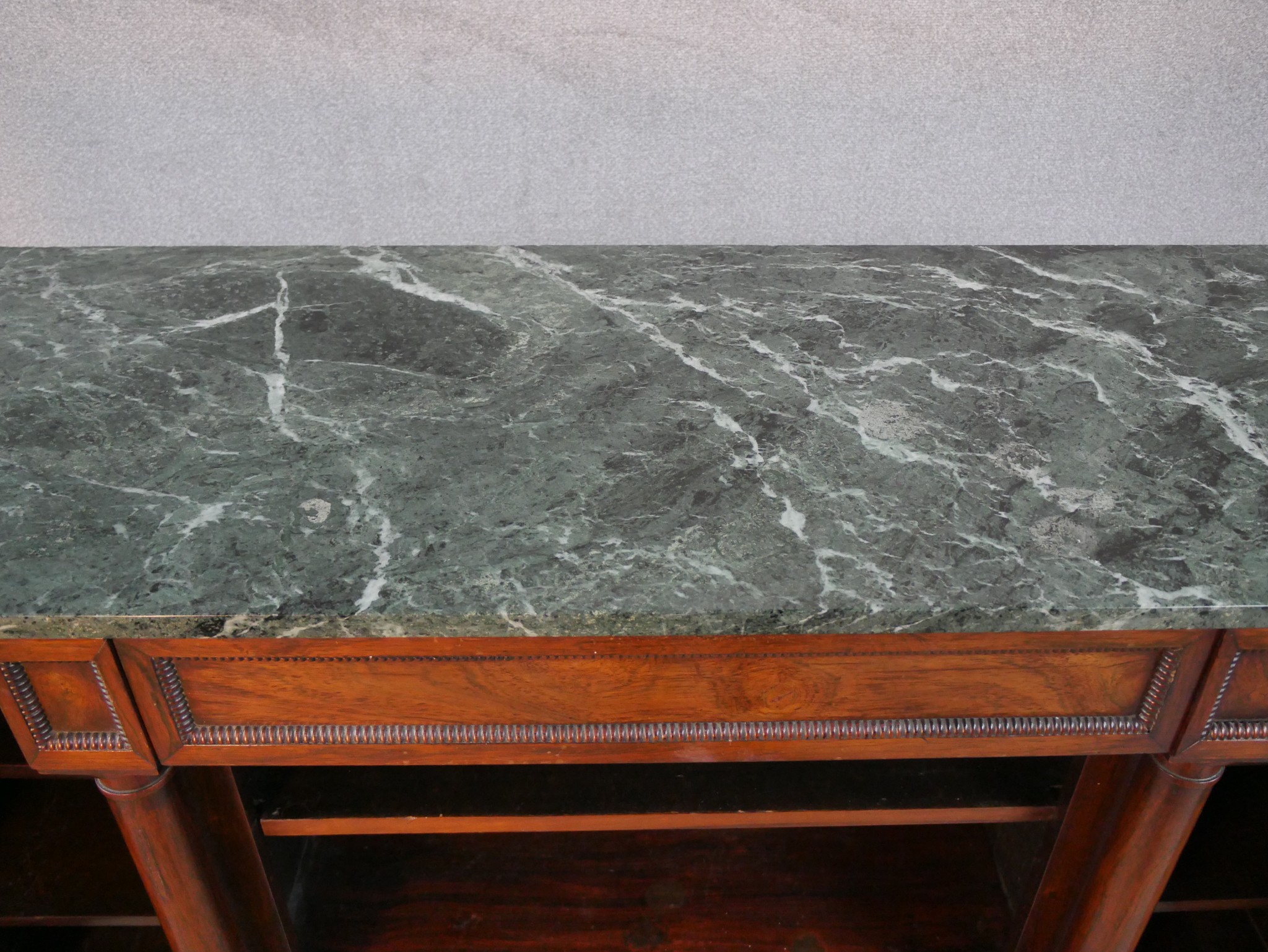 A William IV walnut breakfront sideboard, with a green marble top supported by four columns, with - Image 4 of 7