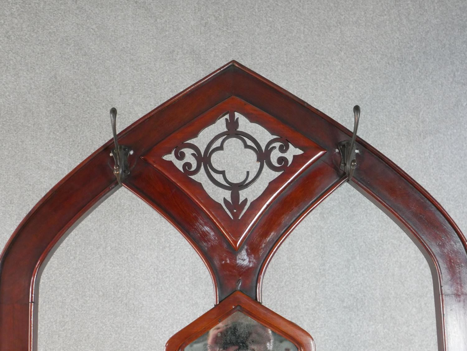 A Victorian Gothic Revival walnut hallstand, of arched form with a pierced panel centred by a - Image 5 of 6