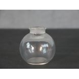 A Lalique perfume bottle, signed to base. (stopper missing) H.6cm