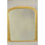 A Victorian gilt framed overmantel mirror, with a bevelled mirror plate, the frame with beaded and