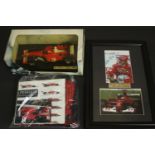 A framed and glazed photo of Michael Schumacher and his card, signed along with other Ferrari