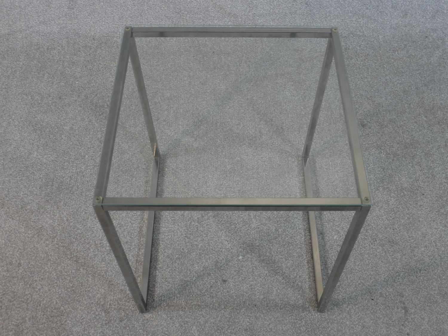 A contemporary cube form occasional table, with a plate glass top on a square section tubular - Image 2 of 3