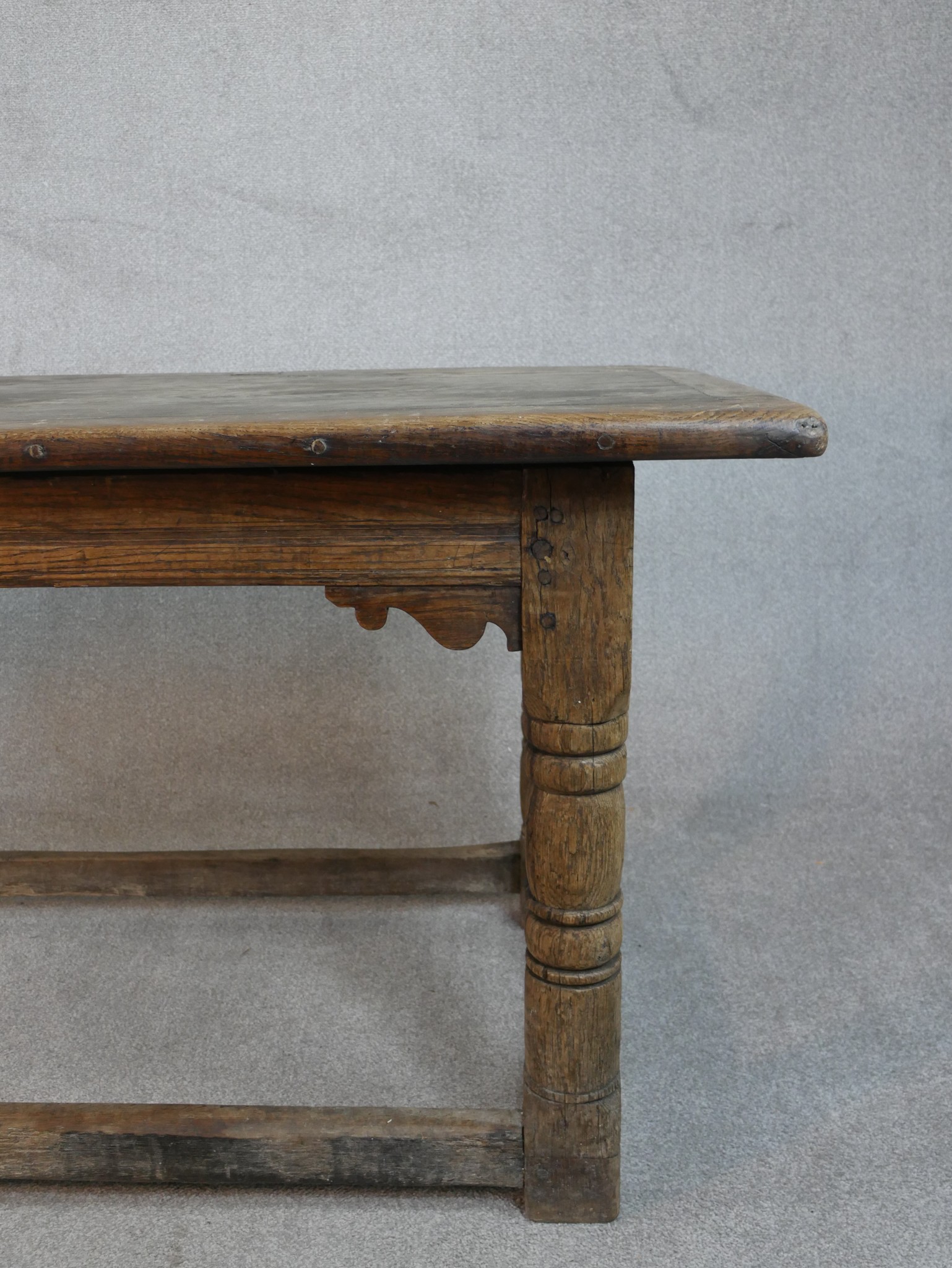An 18th century oak planked top refectory dining table with cleated ends on turned stretched - Image 2 of 5