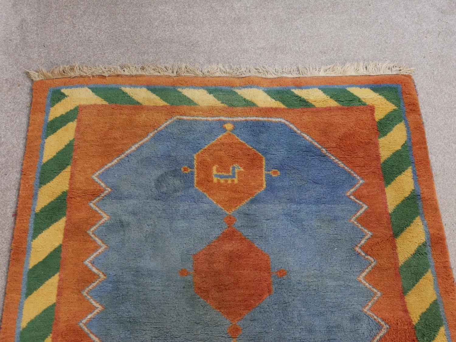 A blue ground hand made Persian Gabbeh rug. L.182 W.120cm - Image 6 of 8