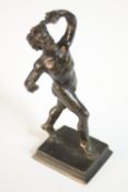 A Grand Tour bronze dancing faun figure, on a rectangular base. H.12 W.2 D.3cm.