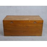 A 19th century camphor wood campaign trunk, of rectangular form with recessed handles to the lid and