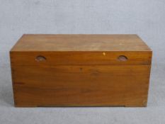 A 19th century camphor wood campaign trunk, of rectangular form with recessed handles to the lid and