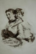 A 19th century black and white photograph on glass of a mother and child. H.38 W.31cm.