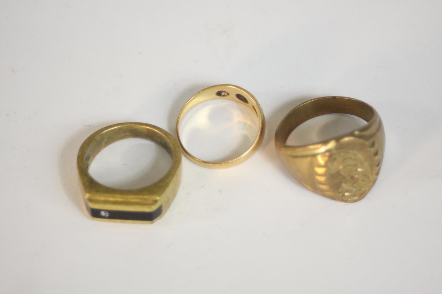 Two gold plated signet style rings along with a Victorian 18 carat yellow gold and old mine