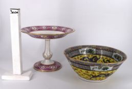 A 20th century Chinese porcelain bowl with dragon decoration along with a rose design and gilded