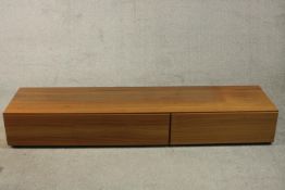 BoConcept, Denmark; a contemporary teak sideboard / media unit, with two fall fronts. H.27 W.192 D.