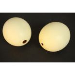 A pair of blown ostrich eggs. H.16 Dia.12cm. (each)