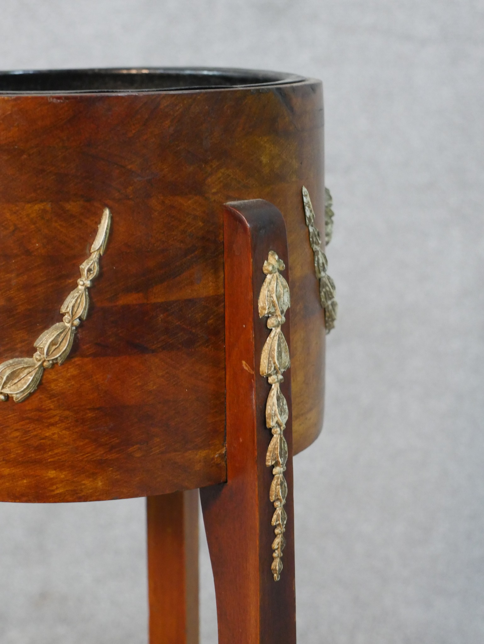 A 20th century fruitwood jardiniere stand, the circular top with gilt metal mounts, on three splayed - Image 3 of 5