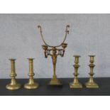 Two pairs of brass candlesticks and a 19th century Classical design two branch gilt spelter