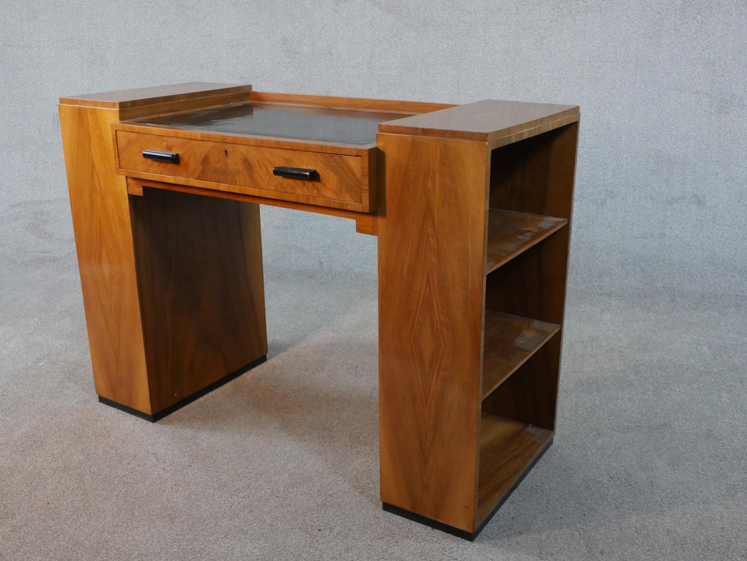 An Art Deco quarter veneered walnut desk with open bookshelves to each pedestal by Maple and Co. H. - Image 6 of 6