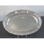 A Ralph Lauren silver plated serving platter with stylised floral design, label verso and