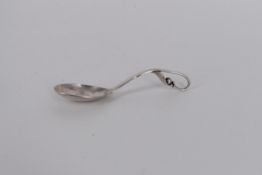 Georg Jensen, a model no. 21 Danish silver sugar spoon with lightly planished bowl and looped peapod