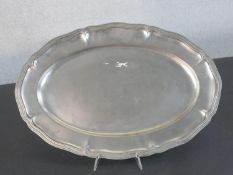 A Ralph Lauren silver plated serving platter with stylised floral design, label verso and