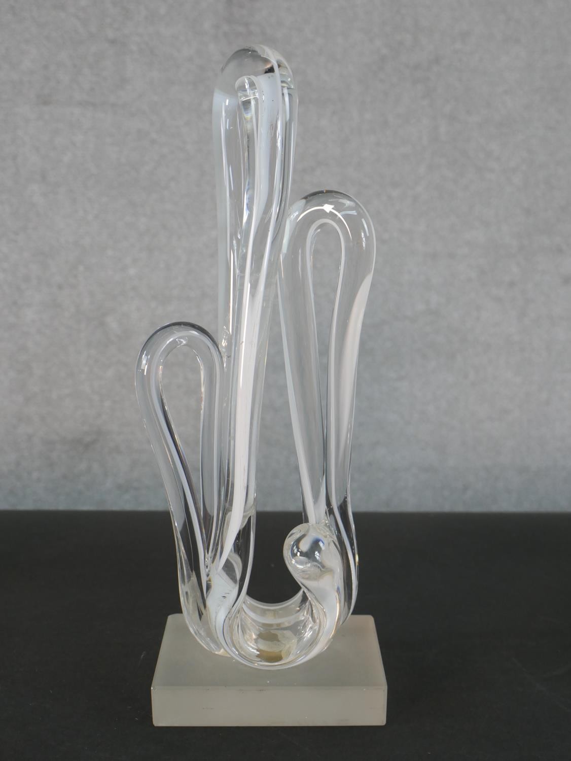 A signed abstract Art Glass sculpture, clear glass with white streaks mounted on a frosted glass - Image 2 of 7