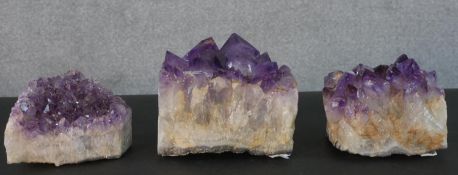 Three large amethyst crystal pieces. H.11 W.14 D.14cm (largest)