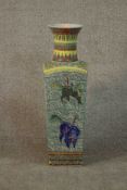 A large early 20th century Chinese hand painted porcelain vase decorated with mythical creatures