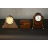 An early 20th century brass cased aneroid barometer by F. Darton & Co, London, contained in oak case
