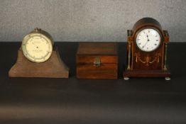 An early 20th century brass cased aneroid barometer by F. Darton & Co, London, contained in oak case