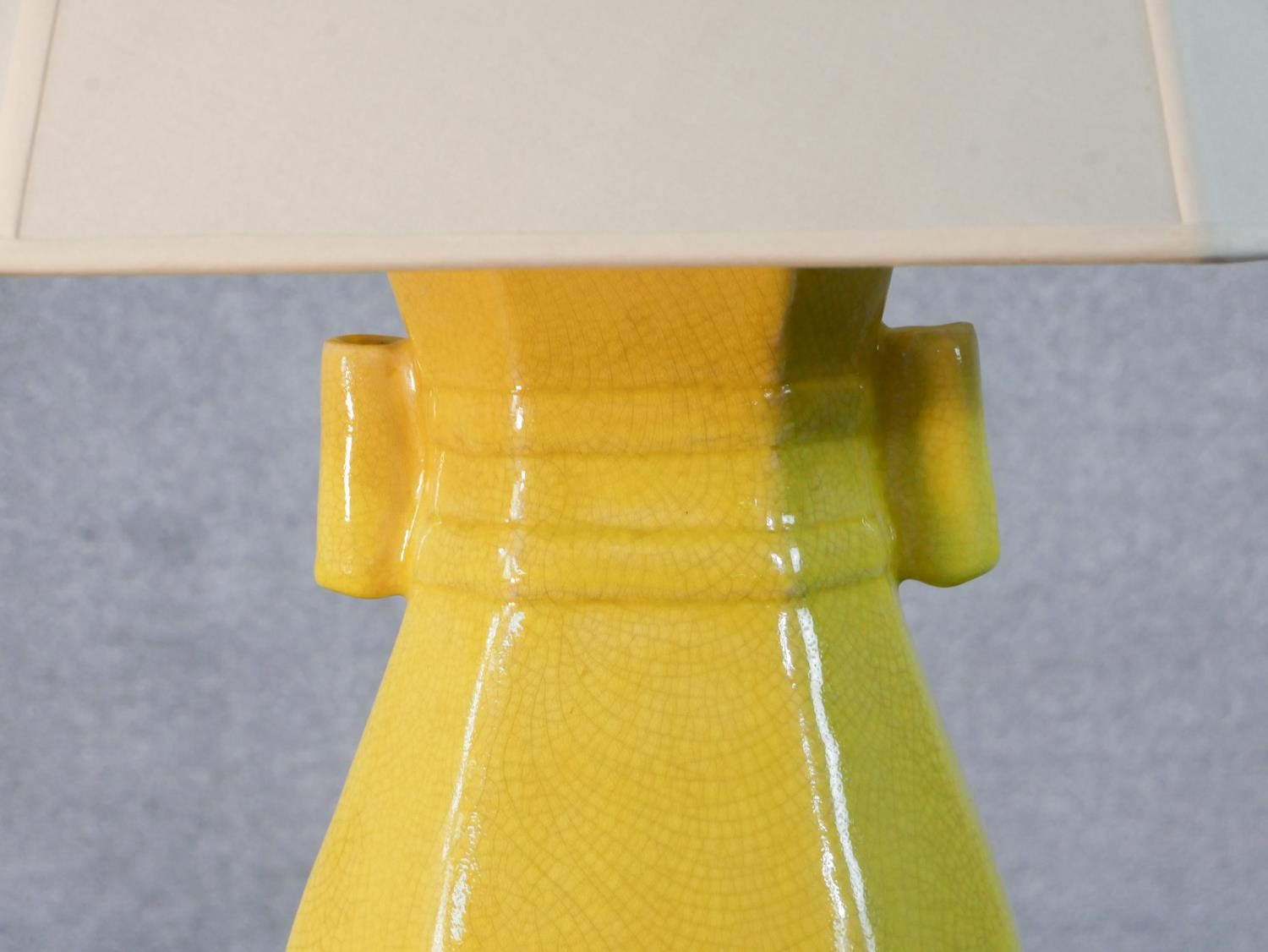 A Chinese yellow glaze vase design table lamp with cream shade. H.61 W.40cm - Image 5 of 6