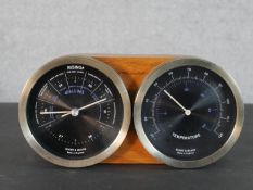 A Short & Mason vintage barometer / thermometer mounted in zebrawood made by Kenneth Grange. H.12