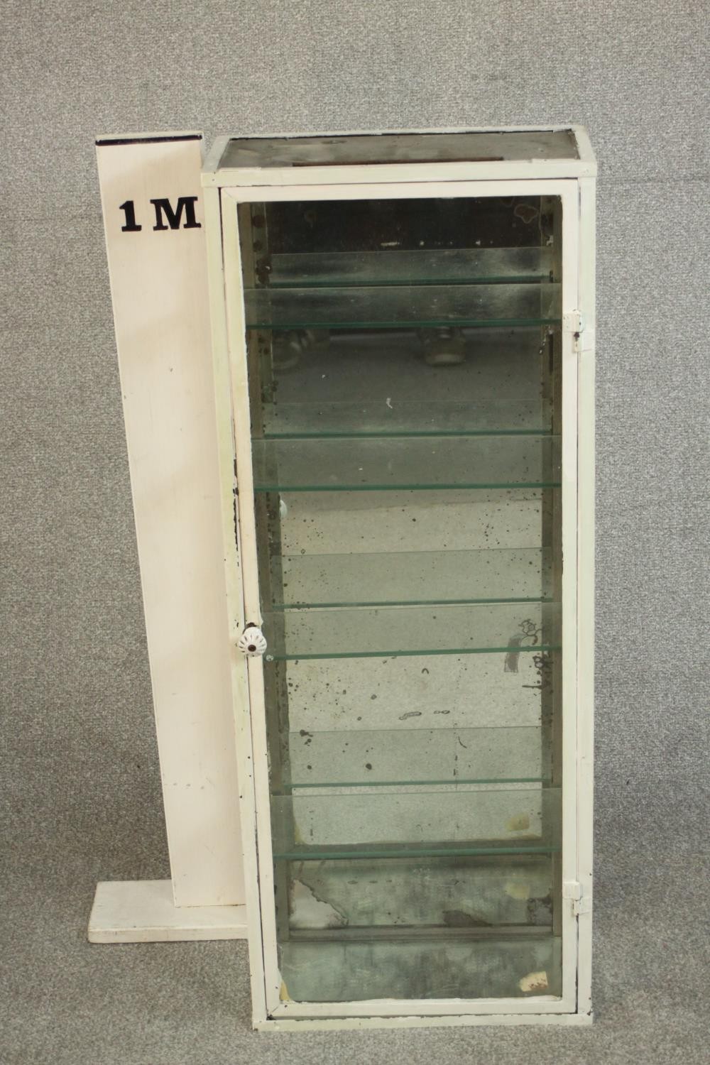 A white painted steel medicine cabinet, of slender form with a glazed door and sides, fitted with - Image 2 of 6