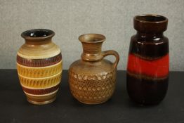 Three vintage West German vases, a large Dumler Breiden honey glaze vase, a Bay impressed spot