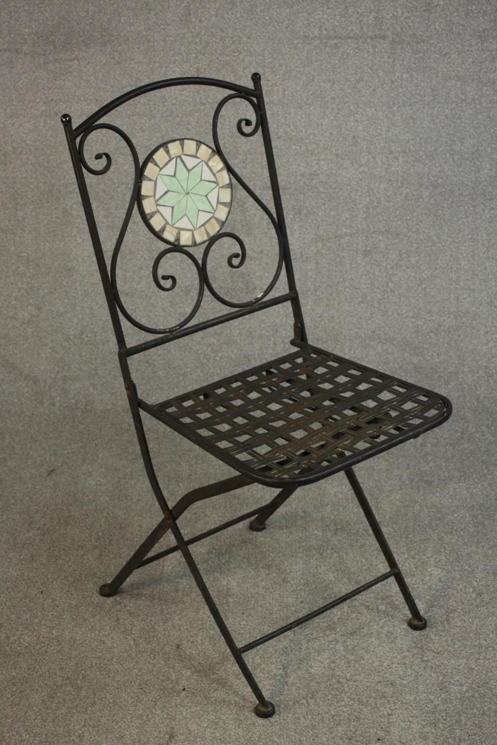 A wrought iron folding chair, the back with circular mosaic, over a slatted seat. - Image 5 of 7