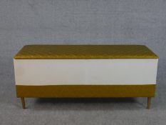 A late 20th century white painted blanket box, of rectangular form, the lid and lower sides