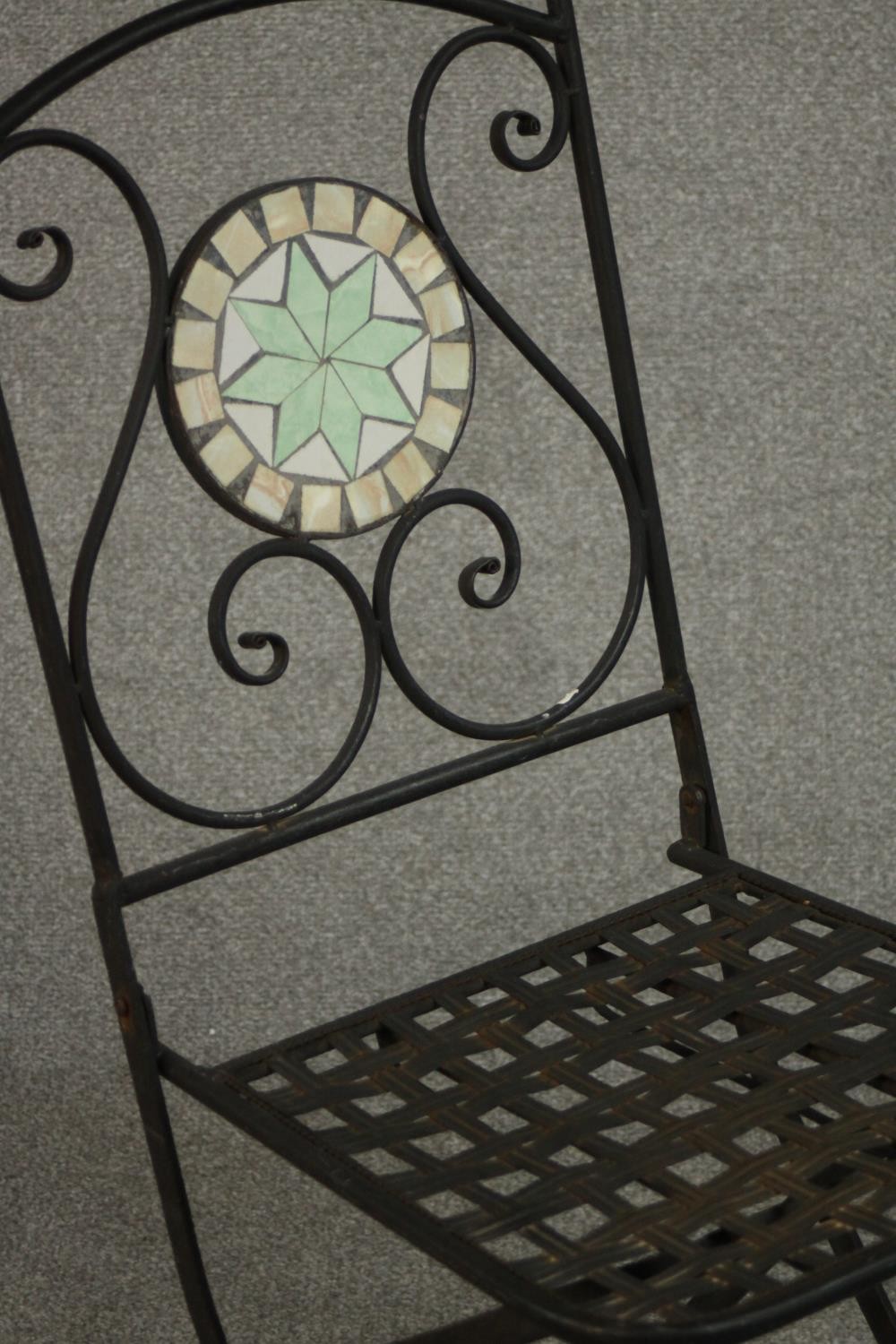 A wrought iron folding chair, the back with circular mosaic, over a slatted seat. - Image 6 of 7