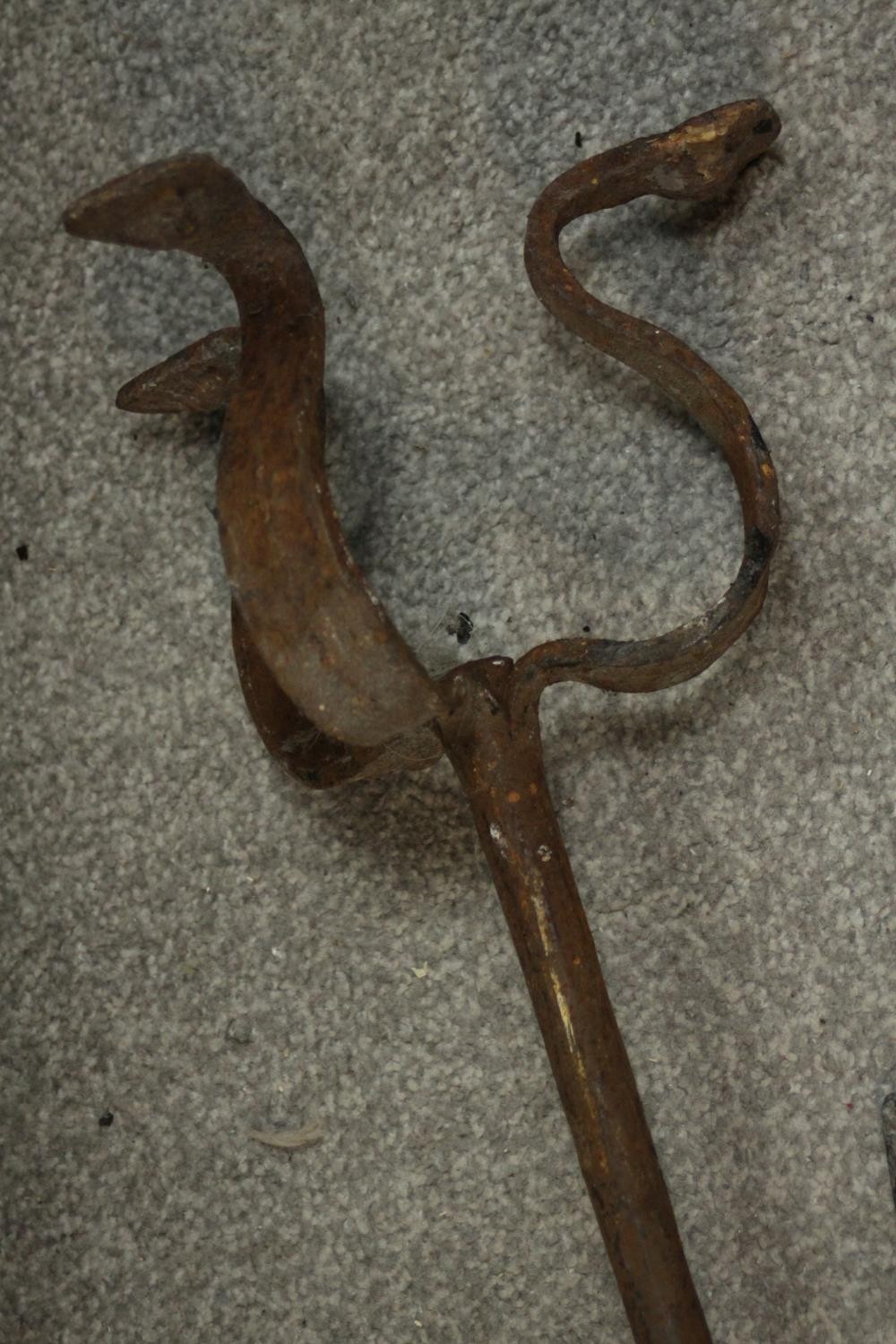 A collection of early 20th century cast iron and brass fire irons, other tools and a cast iron three - Image 7 of 7