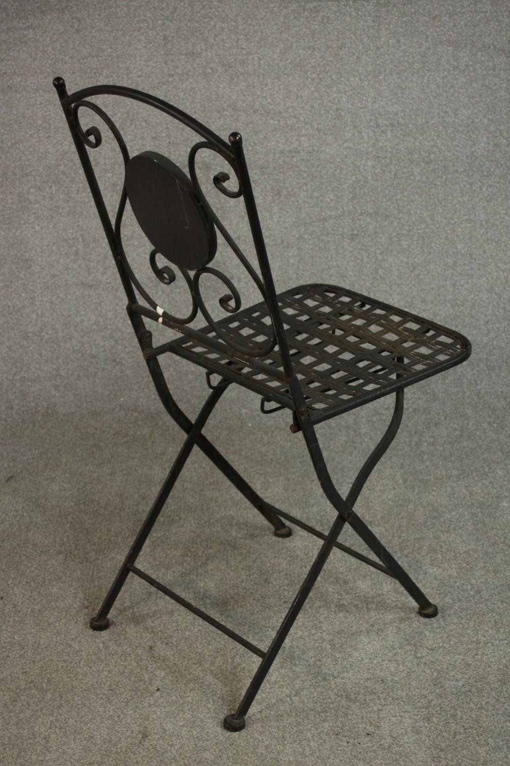 A wrought iron folding chair, the back with circular mosaic, over a slatted seat. - Image 3 of 7