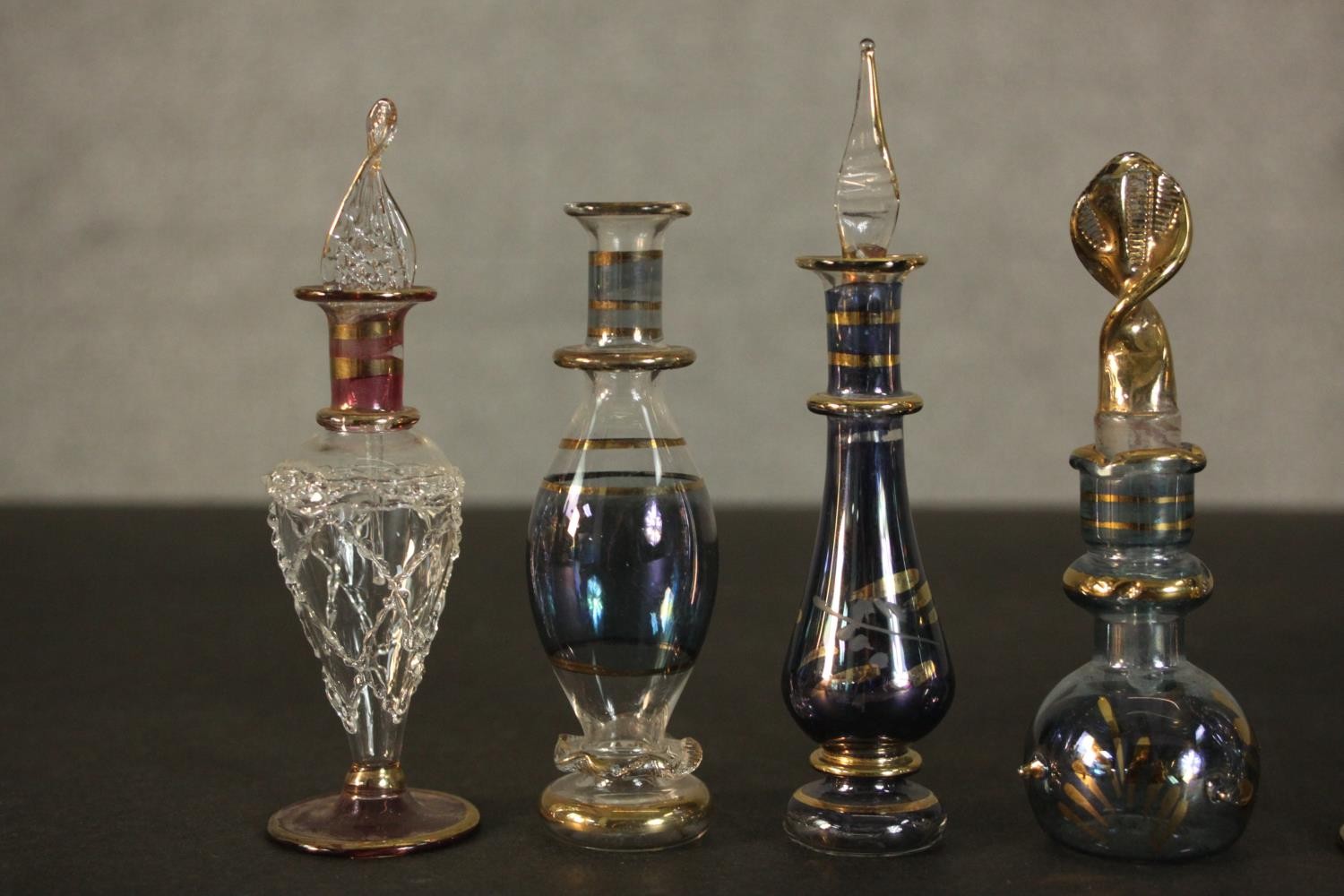 A collection of perfume and snuff bottles, including nine hand blown glass Egyptian bottles with - Image 4 of 11