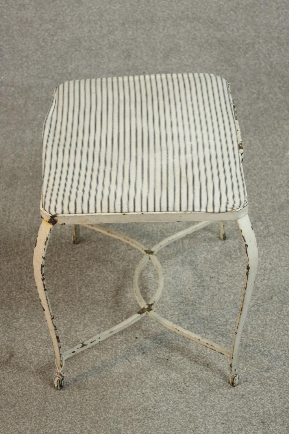 A white painted wrought iron stool, probably French, the seat upholstered in striped black and white - Image 4 of 5